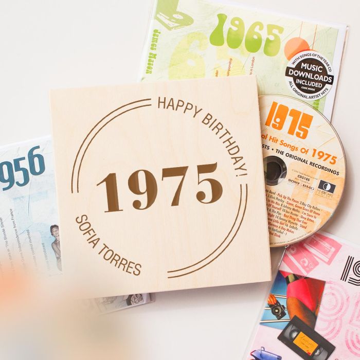 Music CD from desired year with the hits of that year